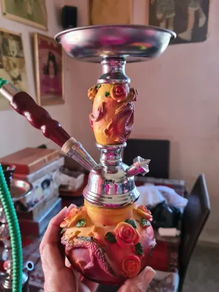 Vasija de cristal roja y dorada