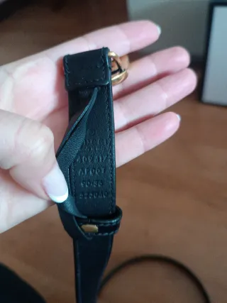 Cinturón Gucci Negro y Dorado.