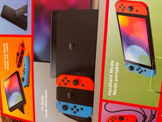 Nintendo Switch OLED - Blu/Arancione