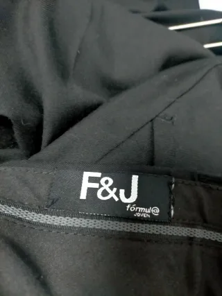 Traje de chaqueta negro. Solo usado una vez.