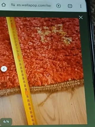 Alfombra de lana naranja con diseño