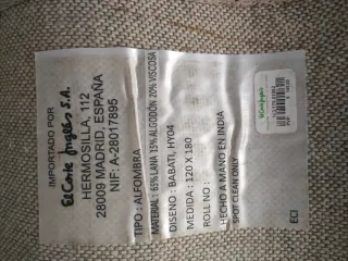 Alfombra beige y marrón de tela