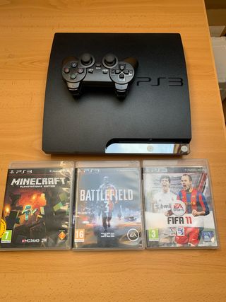 Consola PS3 con mando y 3 juegos