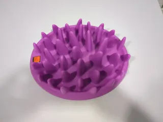 Comedero lento para perros y gatos