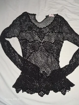 Top negro fiesta. Hay que verlo. Es muy bonito.