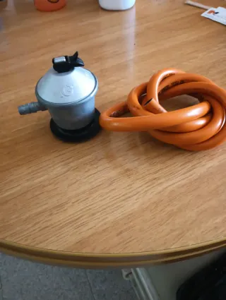 Regulador y goma de butano