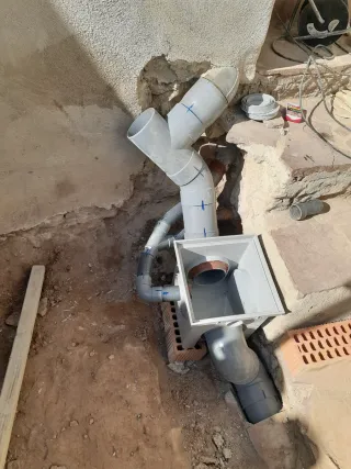 Albañil y fontanero