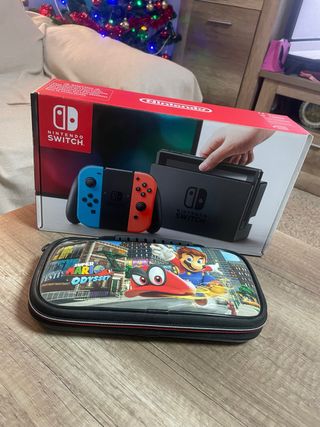 Nintendo Switch + Super Mario Odyssey Case