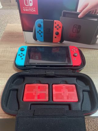 Nintendo Switch + Super Mario Odyssey Case