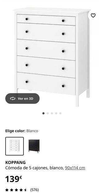 Cómoda blanca con un gato y un pez