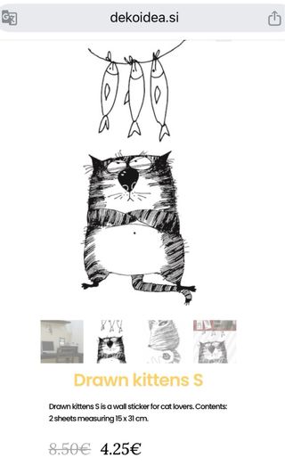 Cómoda blanca con un gato y un pez