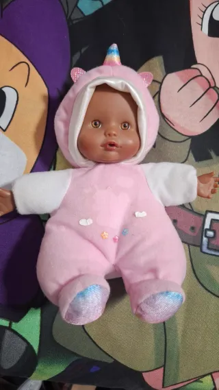 Muñeco bebé pijama unicornio