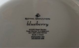 Juego de platos con diseño de olivas