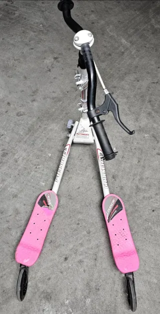 Patinete ruedas rosa