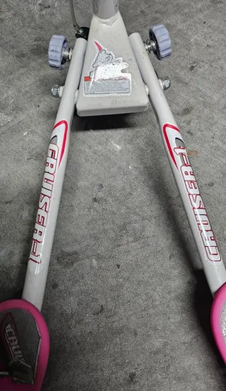 Patinete ruedas rosa