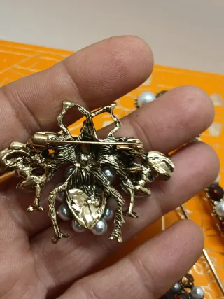 Sfavillante set di 3 spille gioiello dorate