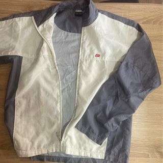 Chaqueta Cortavientos Nike Gris y Blanca