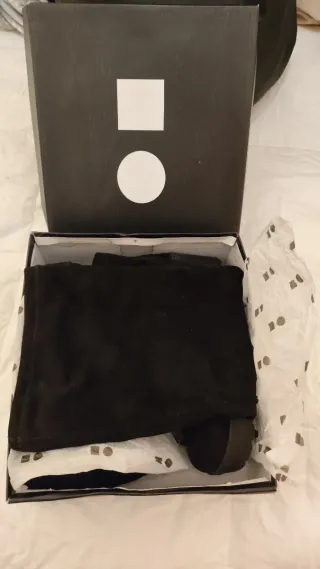 Botas altas negras hasta la rodilla, tacto ante.