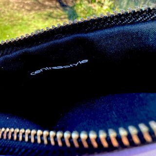 Pochette a righe lilla, bianca e arancio