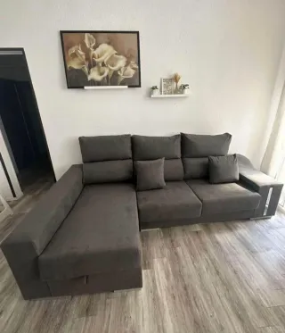 Sofá modular gris de tela
