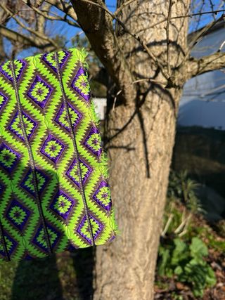 Borsetta tracolla con pon pon