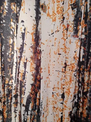 Pantalón satinado estampado