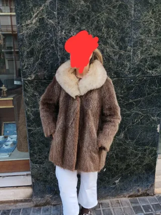 Abrigo de pelo natural.