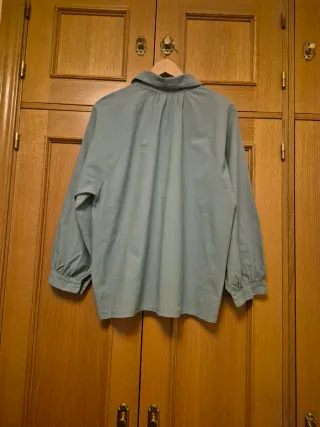 Blusa verde manga abullonada