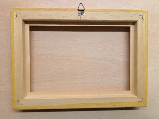 Cornice in legno color oro