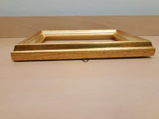 Cornice in legno color oro