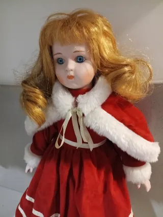 Bambola in ceramica vestita da Babbo Natale