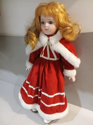 Bambola in ceramica vestita da Babbo Natale