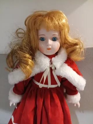 Bambola in ceramica vestita da Babbo Natale