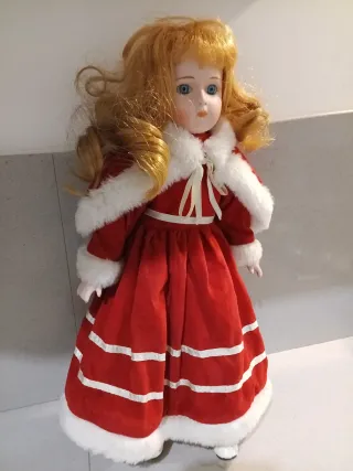 Bambola in ceramica vestita da Babbo Natale