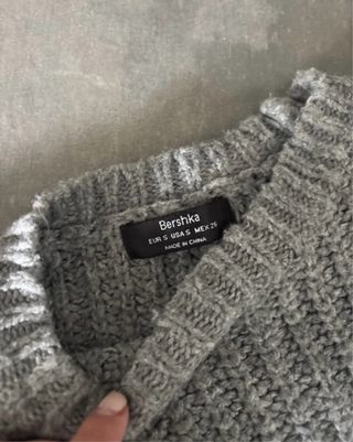 Jersey gris tejido trenzado