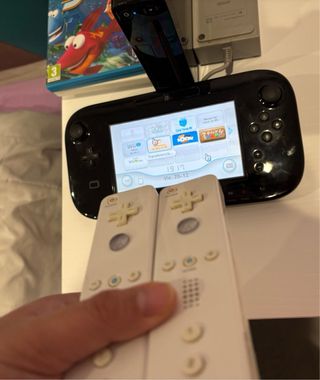 Nintendo Wii U + Controller + Giochi fisici e installati