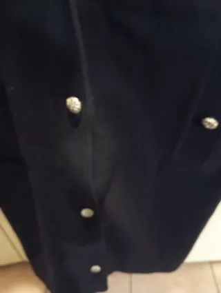 Cappotto nero con pelliccia