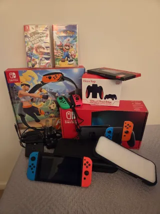 Nintendo Switch + Juegos y Accesorios