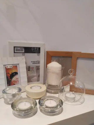 Marcos (2 nuevos) yportavelas de cristal.