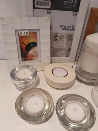 Marcos (2 nuevos) yportavelas de cristal.