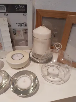 Marcos (2 nuevos) yportavelas de cristal.