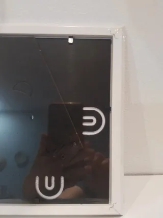 Marcos (2 nuevos) yportavelas de cristal.