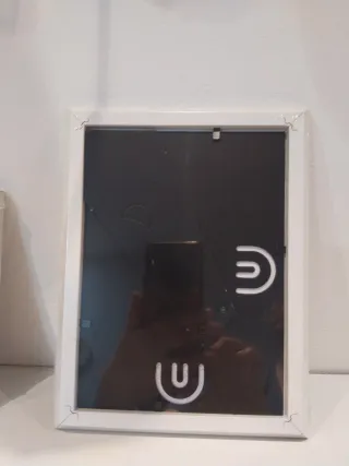 Marcos (2 nuevos) yportavelas de cristal.