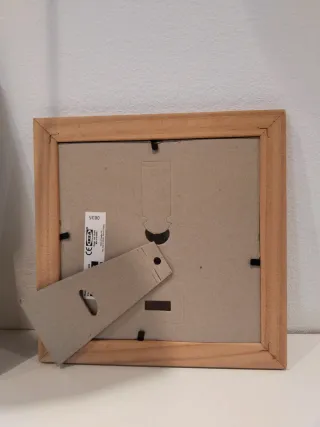 Marcos (2 nuevos) yportavelas de cristal.