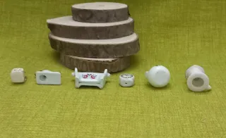 Miniature per casa di bambole