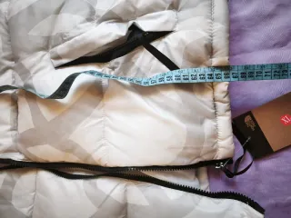 Chaleco The North Face gris y blanco