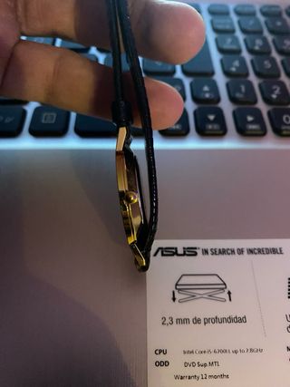 Reloj Movado Cuarzo Dorado y Negro