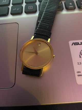 Reloj Movado Cuarzo Dorado y Negro