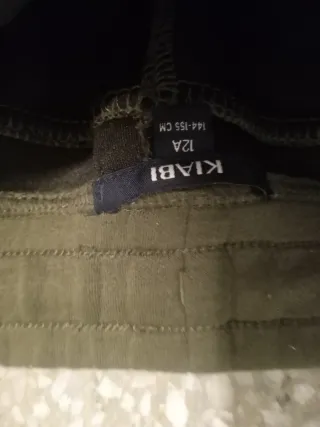 Pantalones de chándal verdes con cremallera