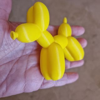 Perro globo amarillo decoración